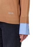 maglia donna con scollo a v e pailettes