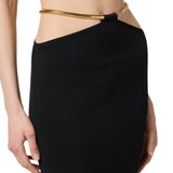 Gonna donna in maglia con snake gioiello