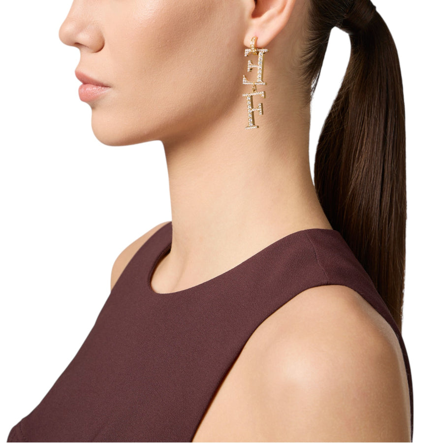 Orecchini donna in ottone con logo pendente