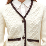 Cardigan donna in maglia motivo trecce