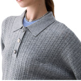 Polo donna in maglia con bottoni gioiello