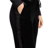 Pantaloni donna in velluto con bande in paillettes