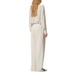 Pantaloni donna  fluidi con piega stirata