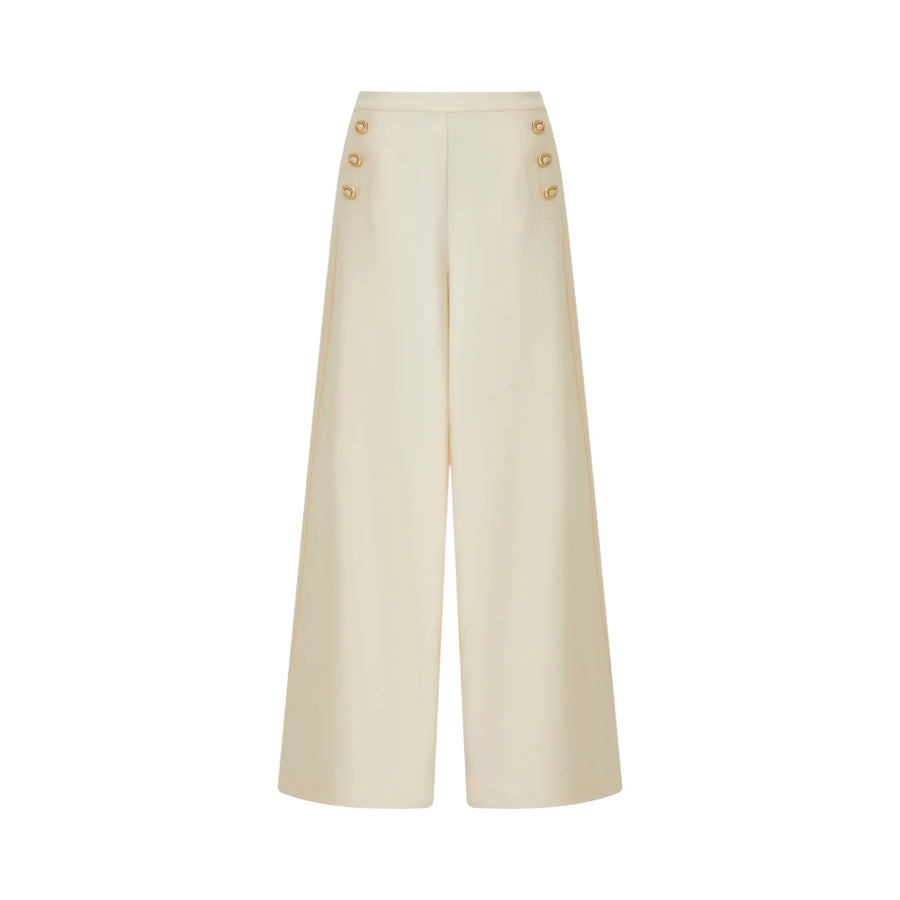 Pantaloni donna crema a gamba larga con bottone laterale