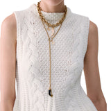 Top donna in maglia a trecce