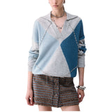 Polo donna argyle con ricami gioiello