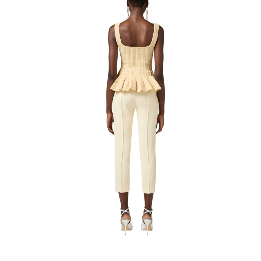 Pantaloni donna  in crêpe con tasche e placca logo