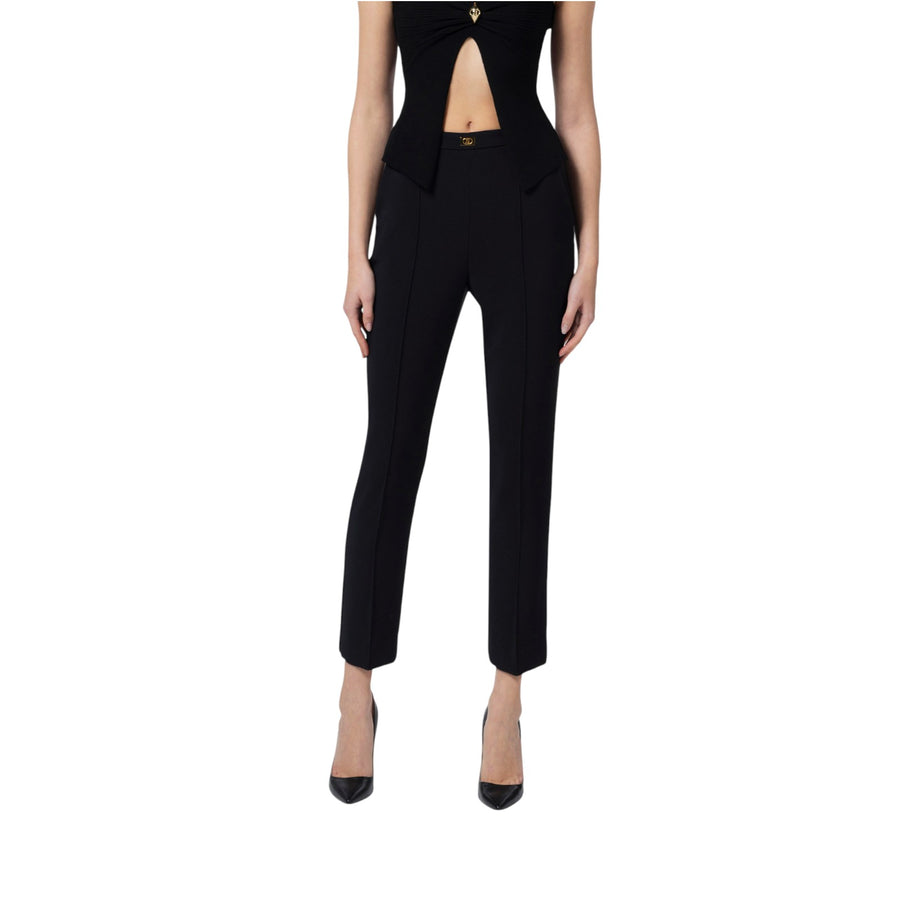 Pantaloni donna  in crêpe con tasche e placca logo