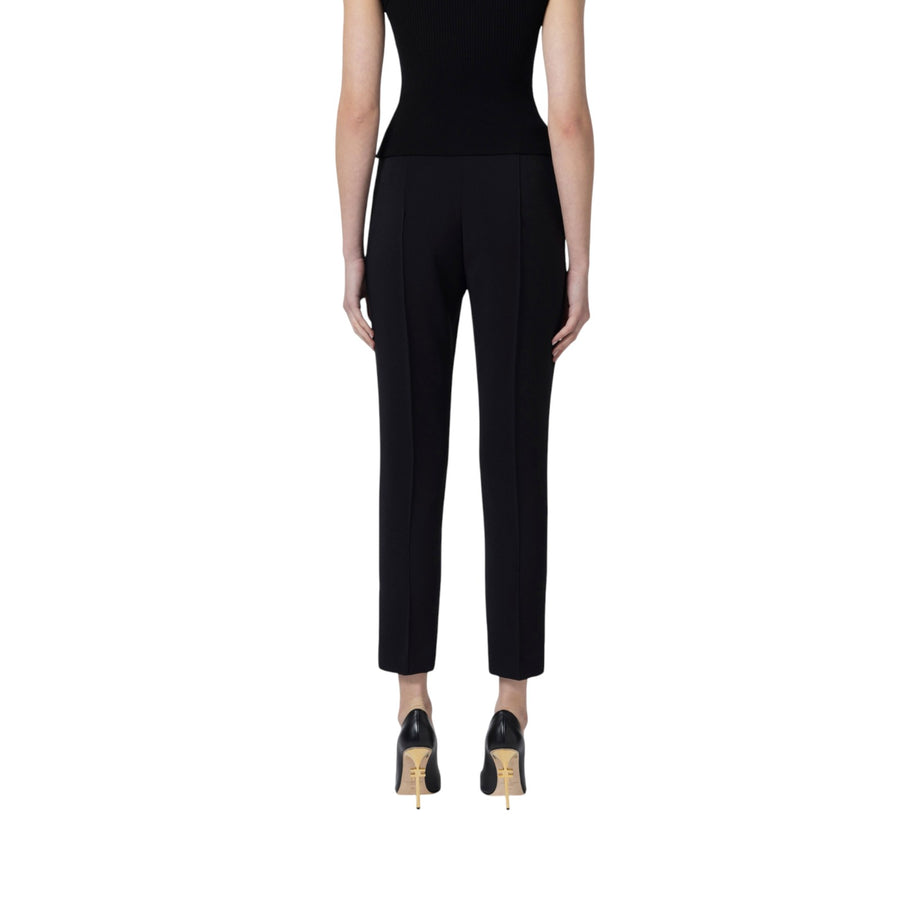 Pantaloni donna  in crêpe con tasche e placca logo