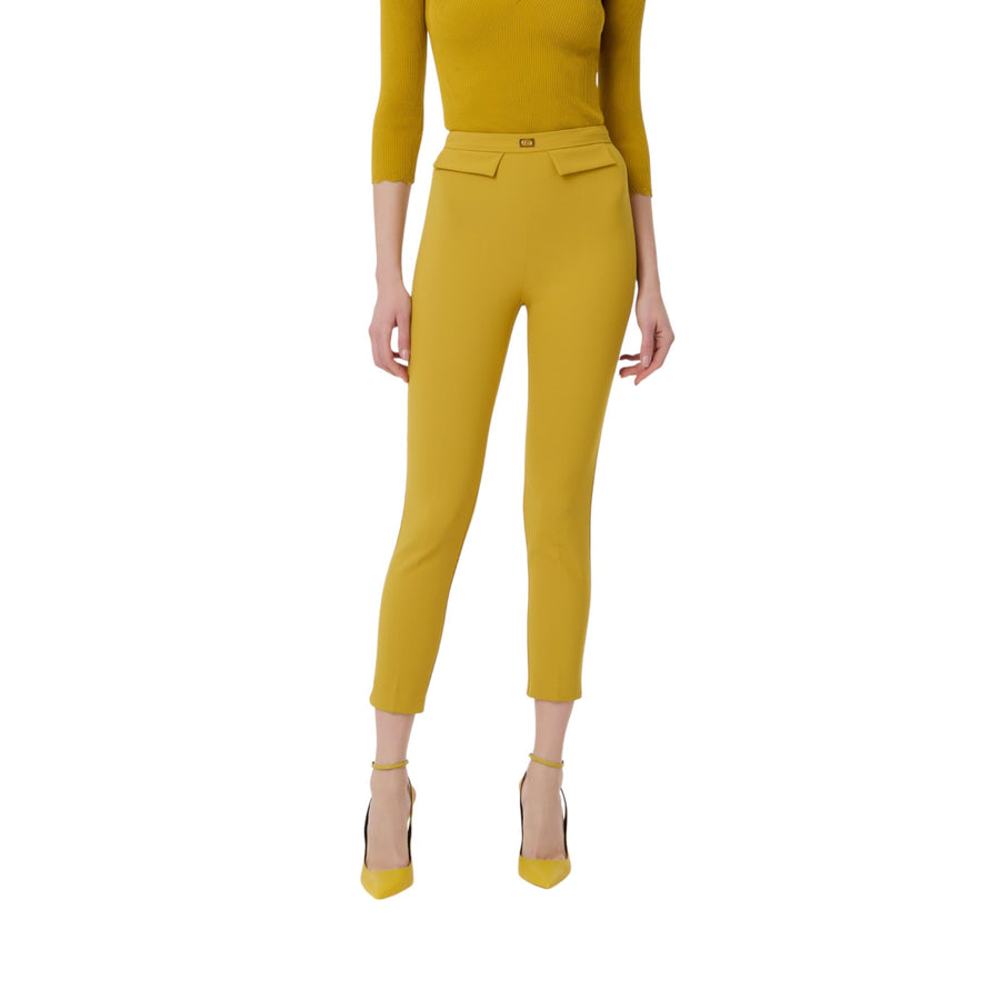 Pantaloni donna  slim in crêpe con placca logo