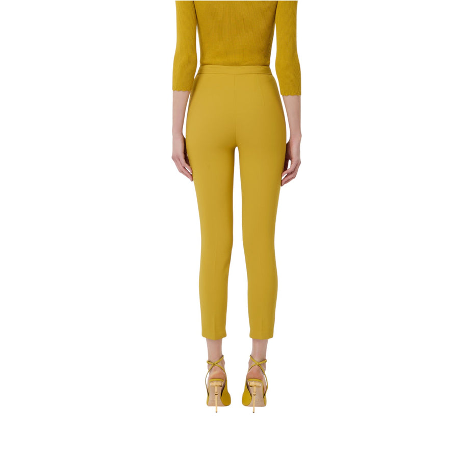 Pantaloni donna  slim in crêpe con placca logo