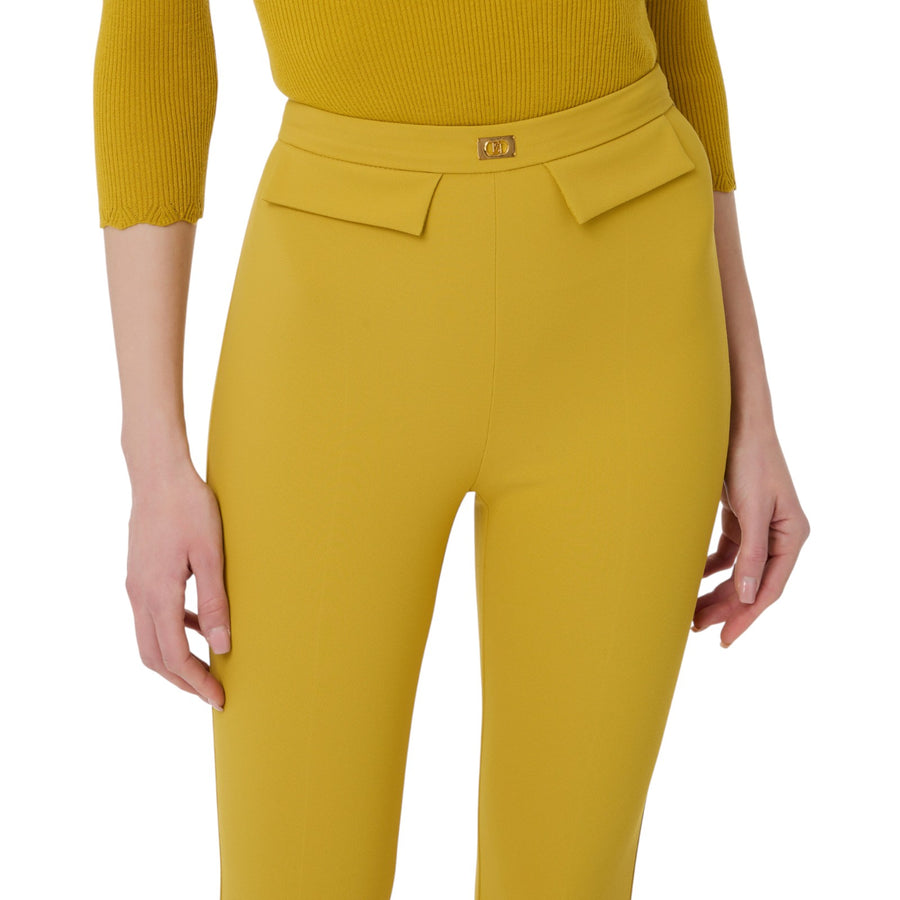 Pantaloni donna  slim in crêpe con placca logo