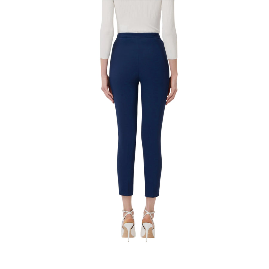 Pantaloni donna  slim in crêpe con placca logo