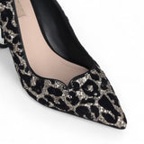 Dècollète donna animalier con glitter