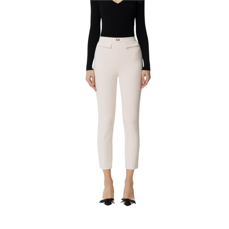 Pantaloni donna  slim in crêpe con placca logo