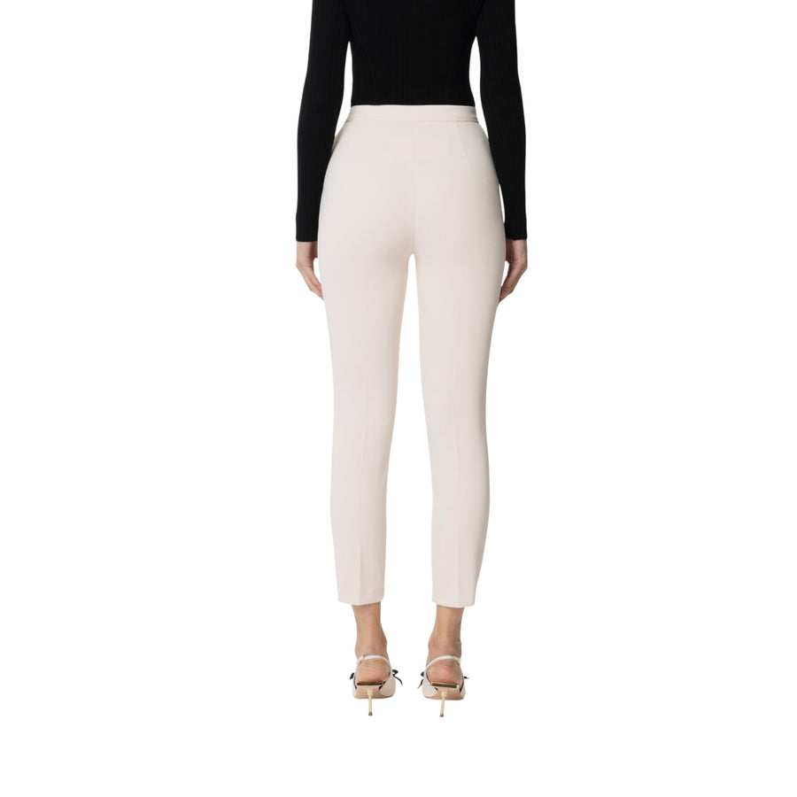 Pantaloni donna  slim in crêpe con placca logo