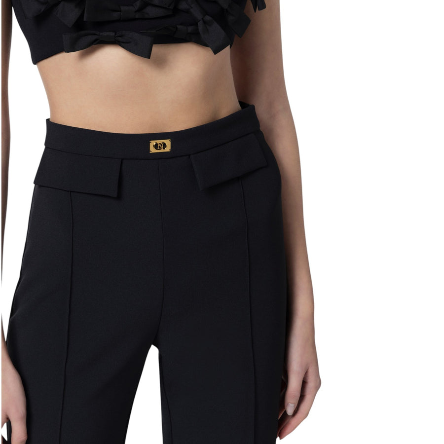 Pantaloni donna  in crêpe con placca logo