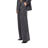 Pantalone donna wide leg con fantasia maculata e microstrass