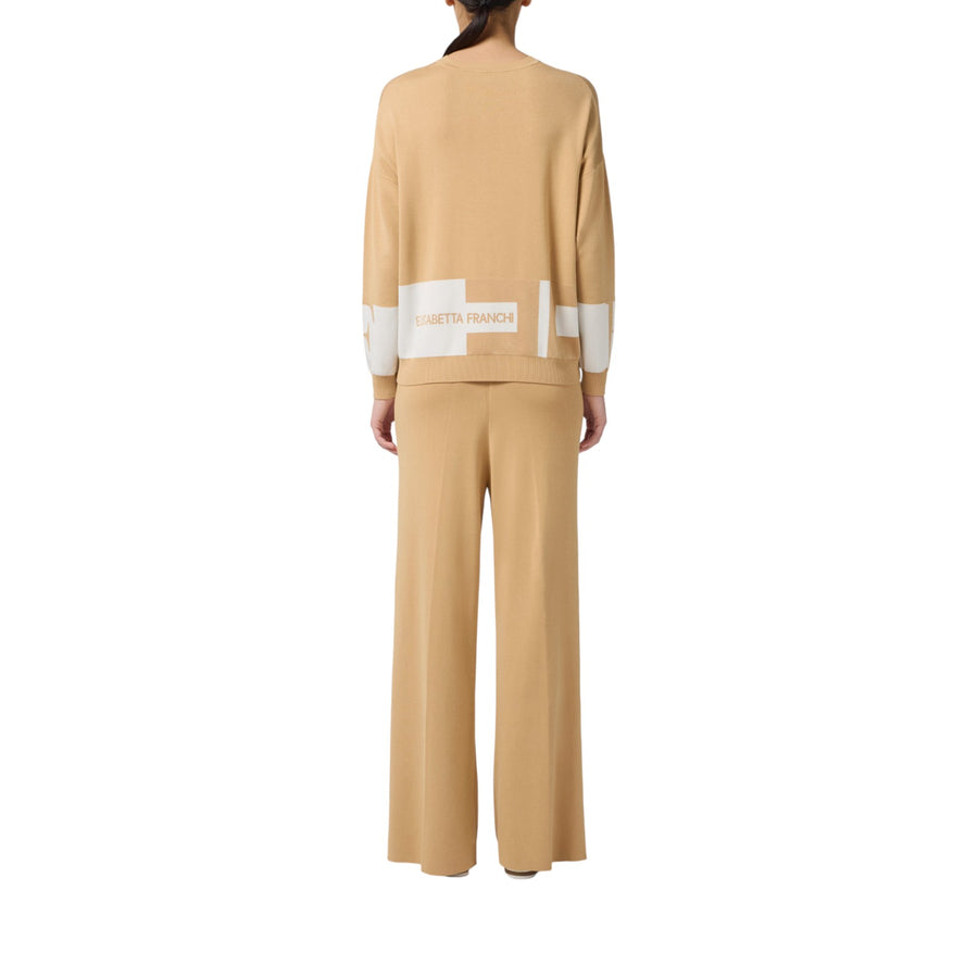 Pantaloni donna in viscosa con bande lucide