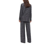 Pantalone donna wide leg con fantasia maculata e microstrass