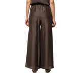 Pantaloni donna a palazzo con micro-borchie