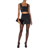 Top donna in maglia con paillettes