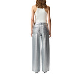 Jeans donna loose in denim laminato