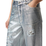 Jeans donna loose in denim laminato
