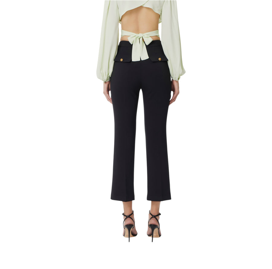Pantaloni donna  cropped in crêpe con placca logo