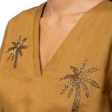Blusa donna in lino con scollo a v e ricamo palme