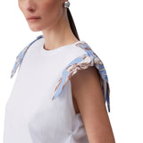 T-shirt donna con spalline imbottite