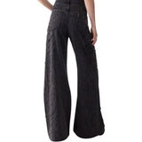 Jeans donna flare con castoni gioiello